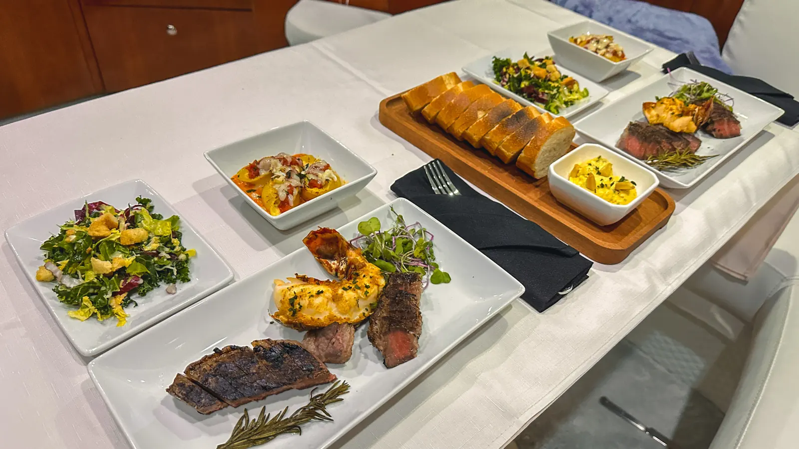 Plated dining prepared for a private yacht charter