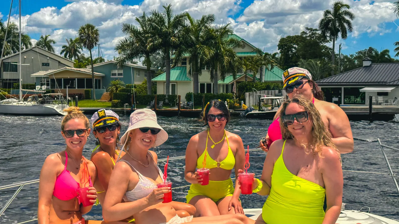 Yacht charter guests relaxing together on the water