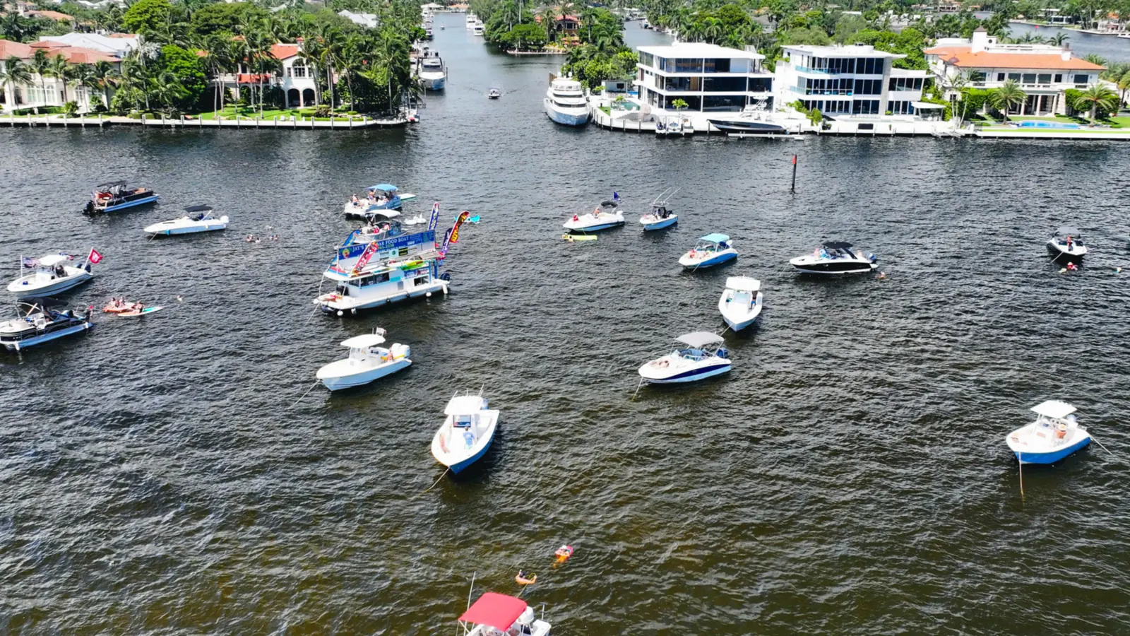 Boats and guests enjoying a South Florida sandbar