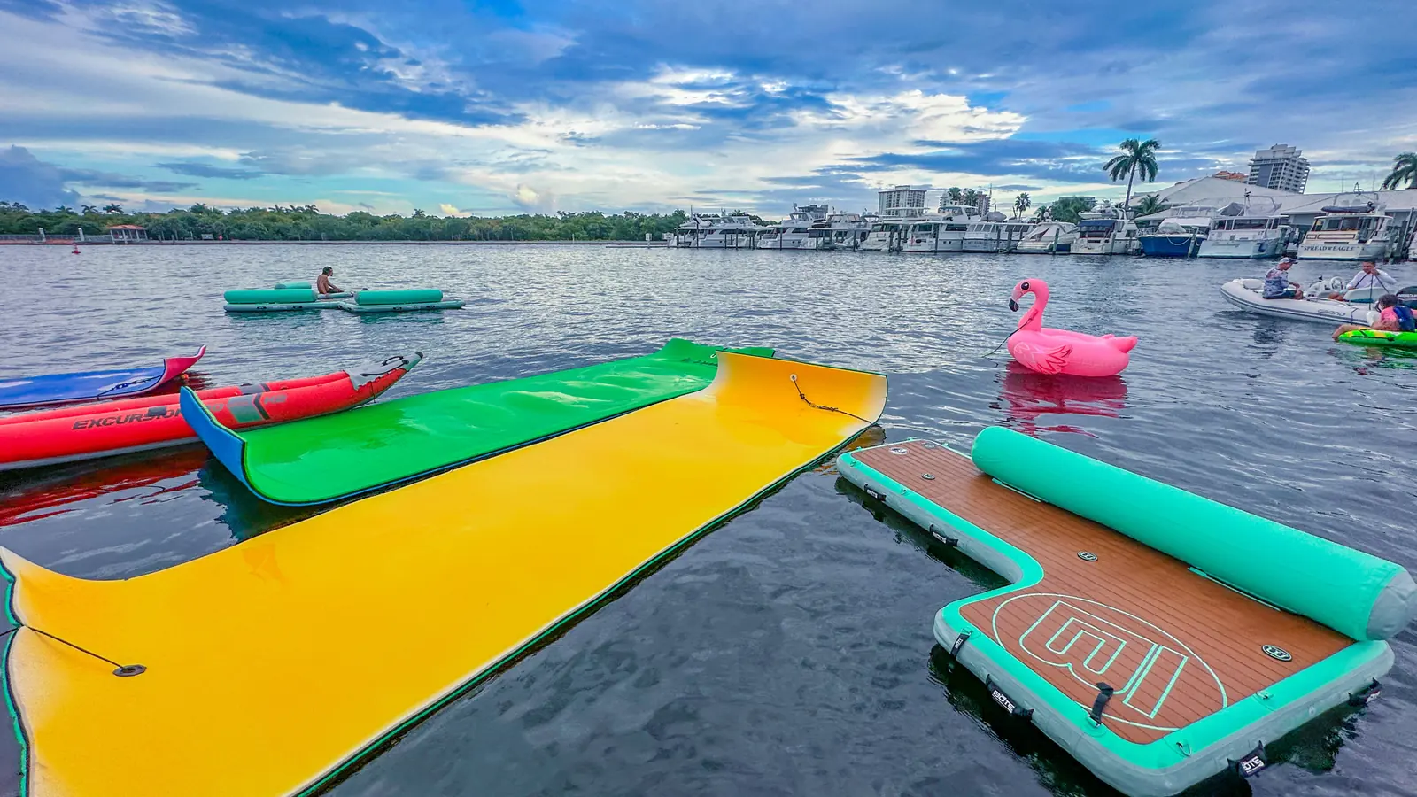 Colorful floating mats arranged for charter guests