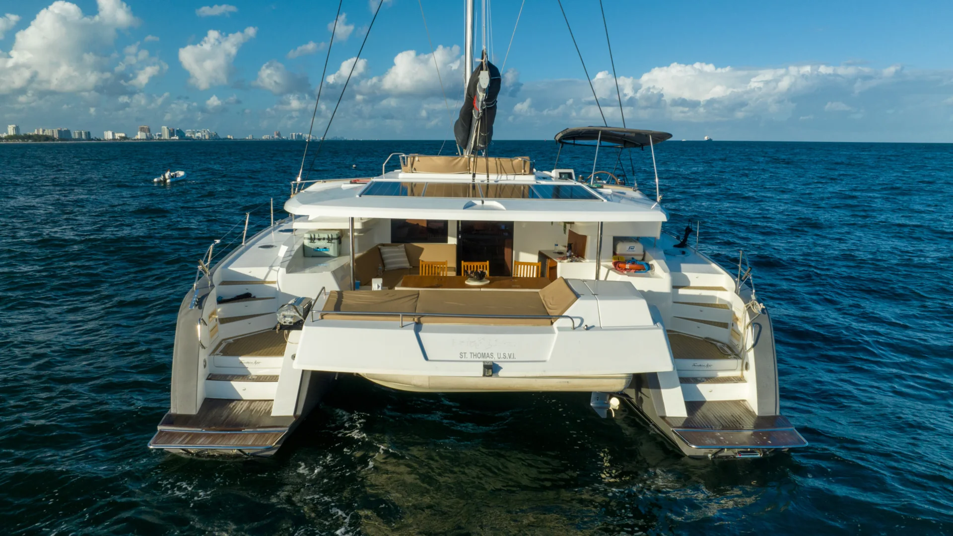 Fountaine Pajot stern cockpit and twin swim platforms viewed from the water